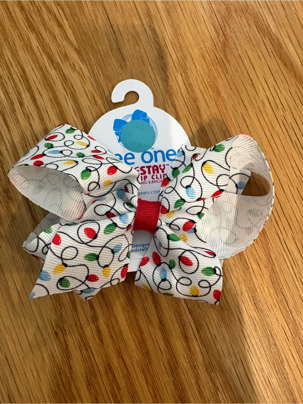 Wee Ones White Bow Clip with Multicolor Light Print and Red Center